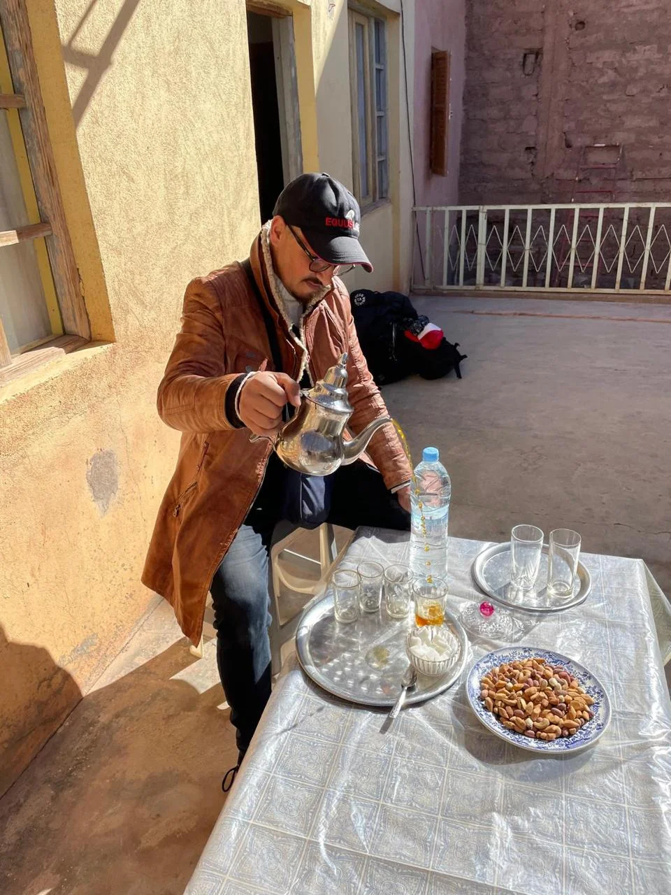 Traditional Moroccan mint tea hospitality in Tighedouine